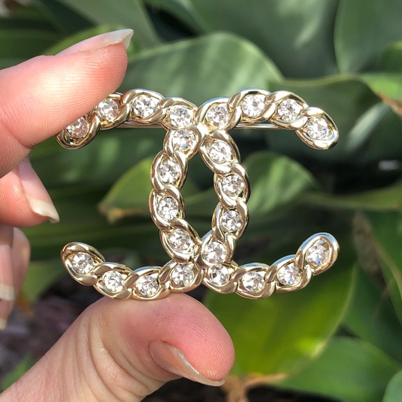 CHANEL Jewelry - Chanel gold chain crystal cc logo brooch